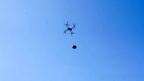 黄山之巅的“科技扁担”：无人机接过千年重担，...